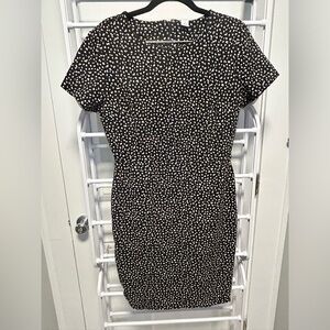 Size M black bodycon dress with light tan designs
